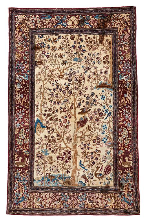 A RUG, a semi-antique Esfahan probably, figural, ca 214,5 x 137,5 cm.