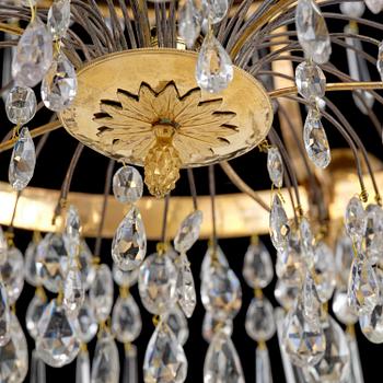 A late Gustavian gilt brass and cut glass seven-light chandelier, Stockholm, late 18th century.