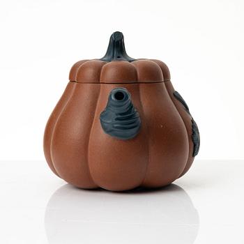 A Chinese yixing 'gourd' teapot, four cups and three saucers, 1980s.