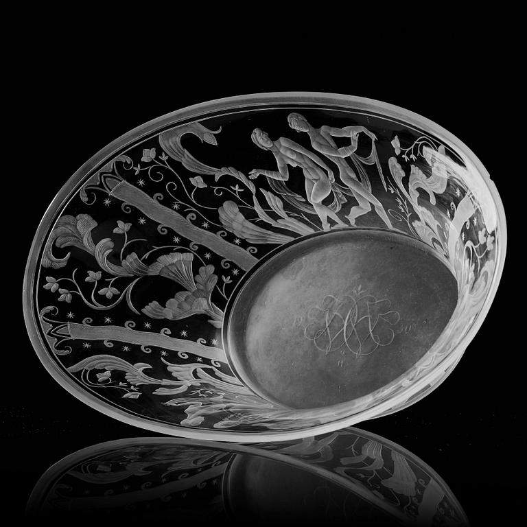 Simon Gate, a Swedish Grace engraved glass bowl with stand, Orrefors 1930, model 147, engraved by Karl Rössler.