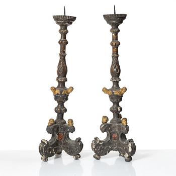 A pair of Baroque style candleholders, 19th Century.