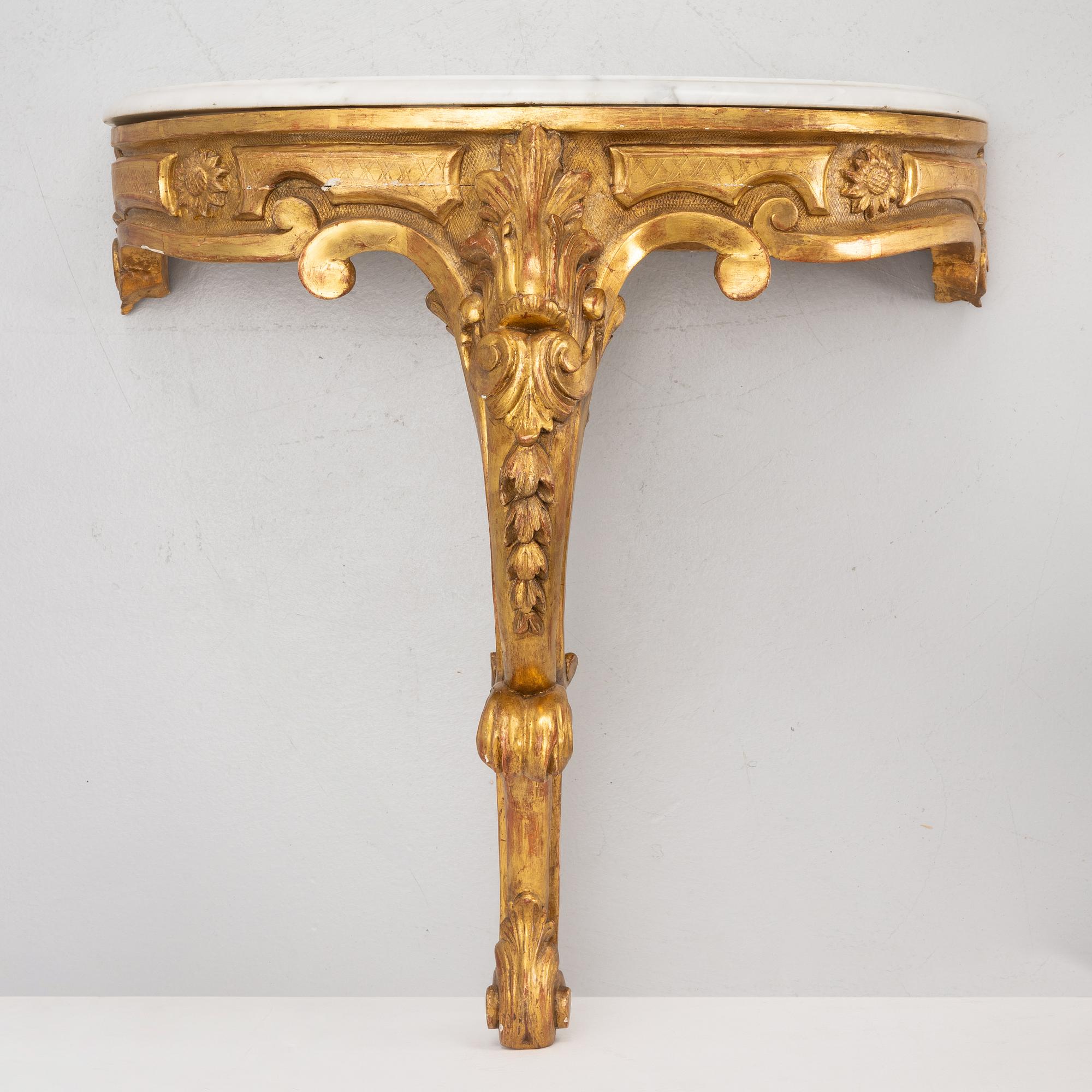 A Rococo style onsole table, circa 1900.