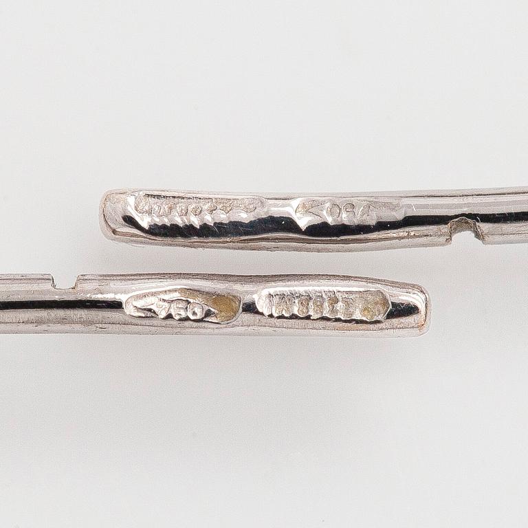 Örhängen, 18K vitguld med briljantslipade diamanter.