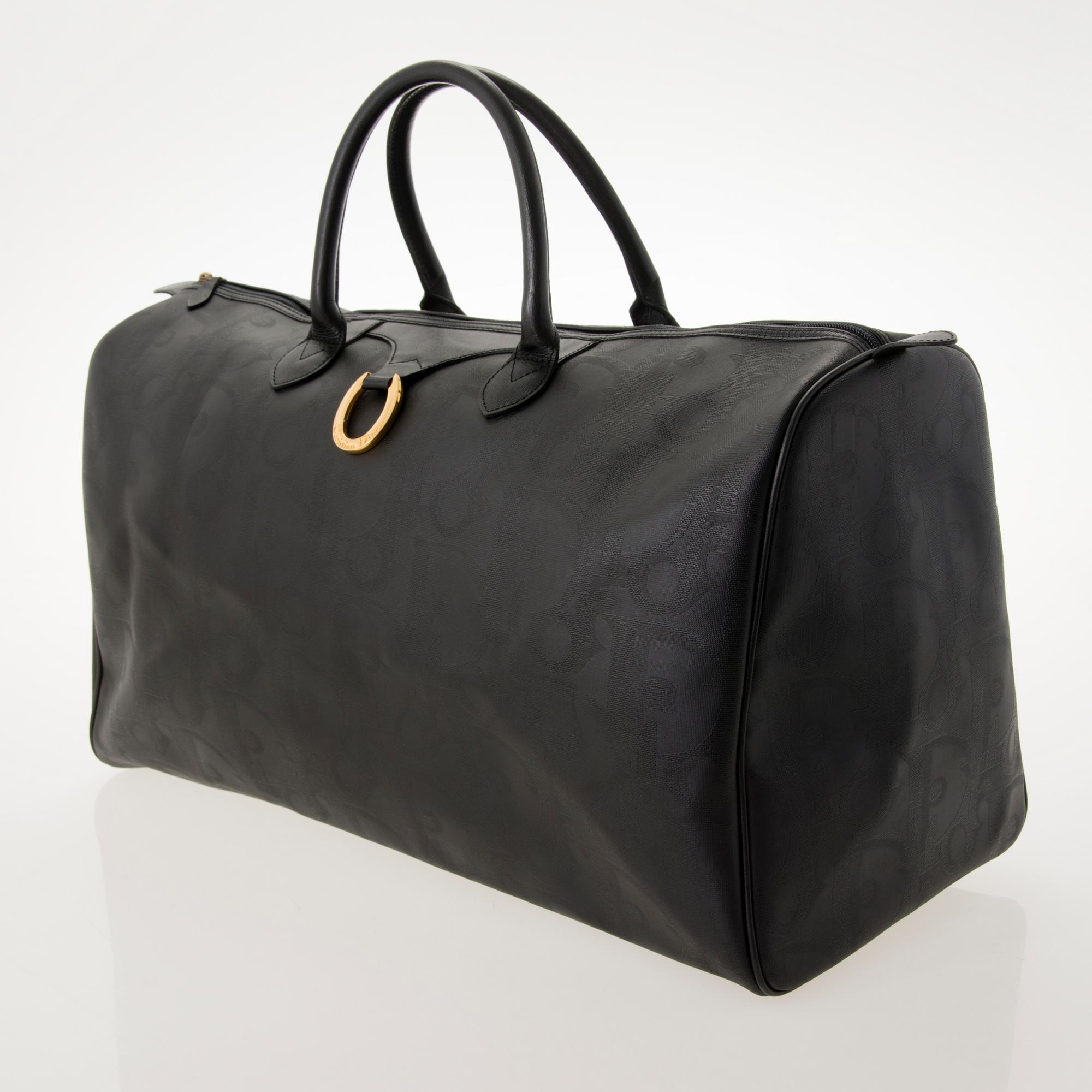 CHRISTIAN DIOR Black Monogram Coated Canvas Duffel Bag.
