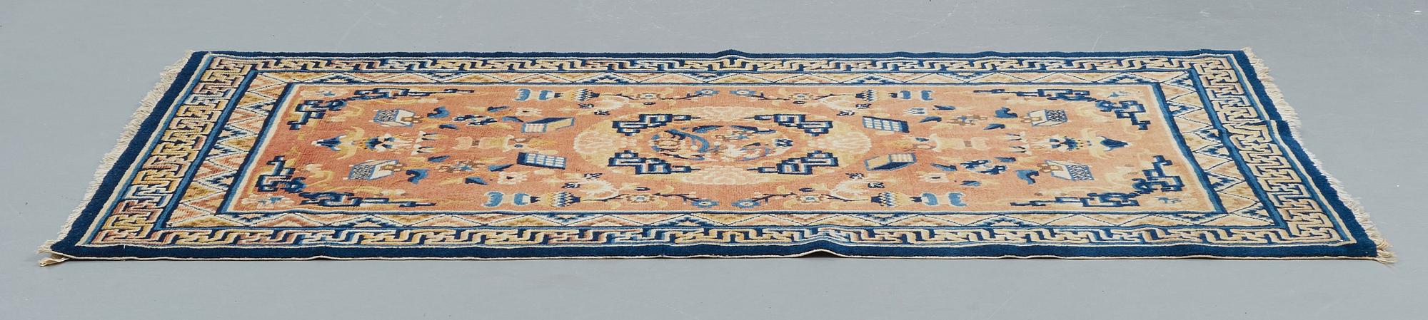 A CARPET, a semi-antique Ningxia, ca 197 x 127 cm.