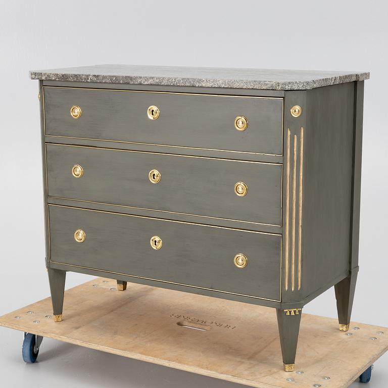 A Gustavian style chest of drawers, 20th century.