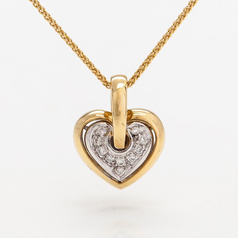 An 18K gold necklace with a heart shaped pendnat with diamonds ca. 0.09 ct in total.
