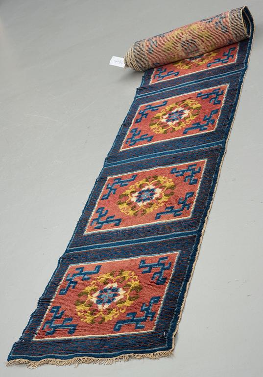 MATTO, a meditation carpet, ten squares, a semi-antique Ningxia, China, ca 598,5 x 62 cm.