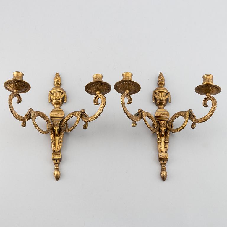 A 20th Century pair of Louis XVI style wall sconces, for two candles.