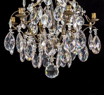 An early 20th century chandelier with glass prisms.