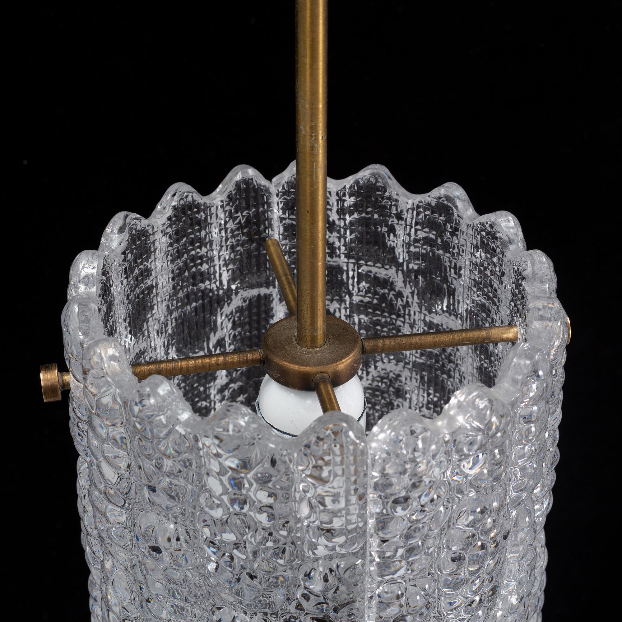 Carl Fagerlund, taklampor, ett par, glas och mässing, Orrefors, 1900-tal.