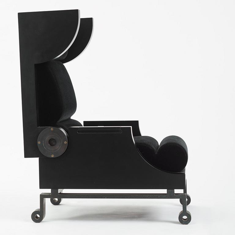 Alexander H Damsbo & Henrik Ingemann Nielsen, a "HC-Andersen Chair" armchair/table, ed. 3/49, Källemo, post 2005.