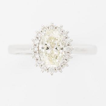 Ring with an oval brilliant-cut diamond of 1.20 ct accompanied by the following GIA report.