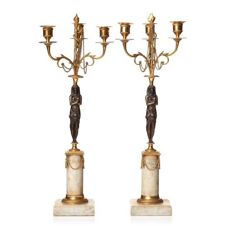 A pair of late Gustavian circa 1800 three-light candelabra.