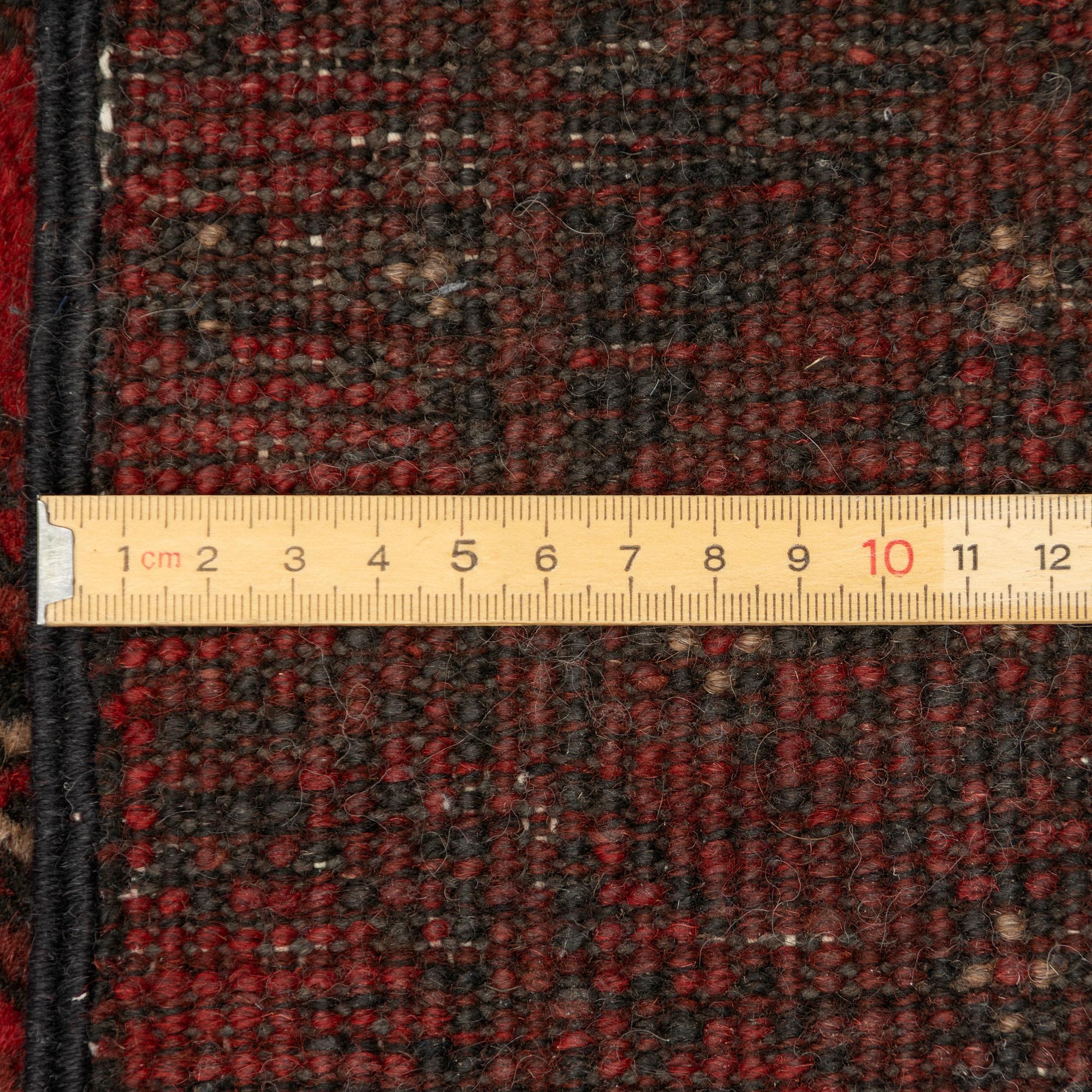 An oriental / Afghan runner, approx. 478 x 81 cm.