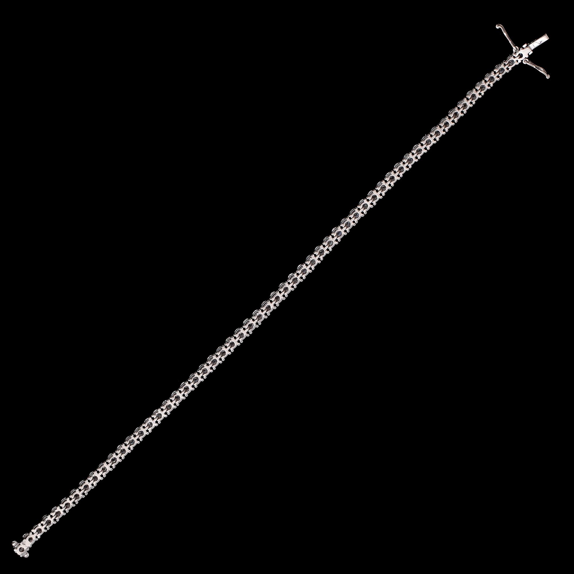 ARMBAND, 18 k vitguld, Rivière, 56 briljantslipade diamanter totalt 5.27 ct.