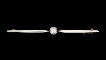 BROSCH, 14 K vit- och rödguld, med gammalslipad diamant ca 0,30 ct. Vikt 4,1 g.