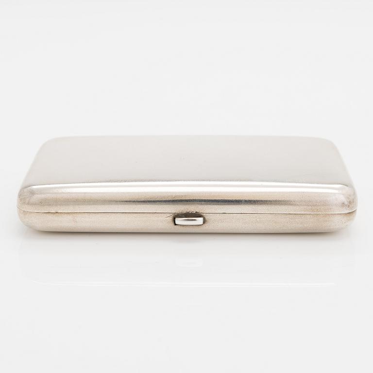 A silver cigarette case, Hlebnikov,  Imperial warrant, unidentified maker's mark, Moscow 1899-1908.