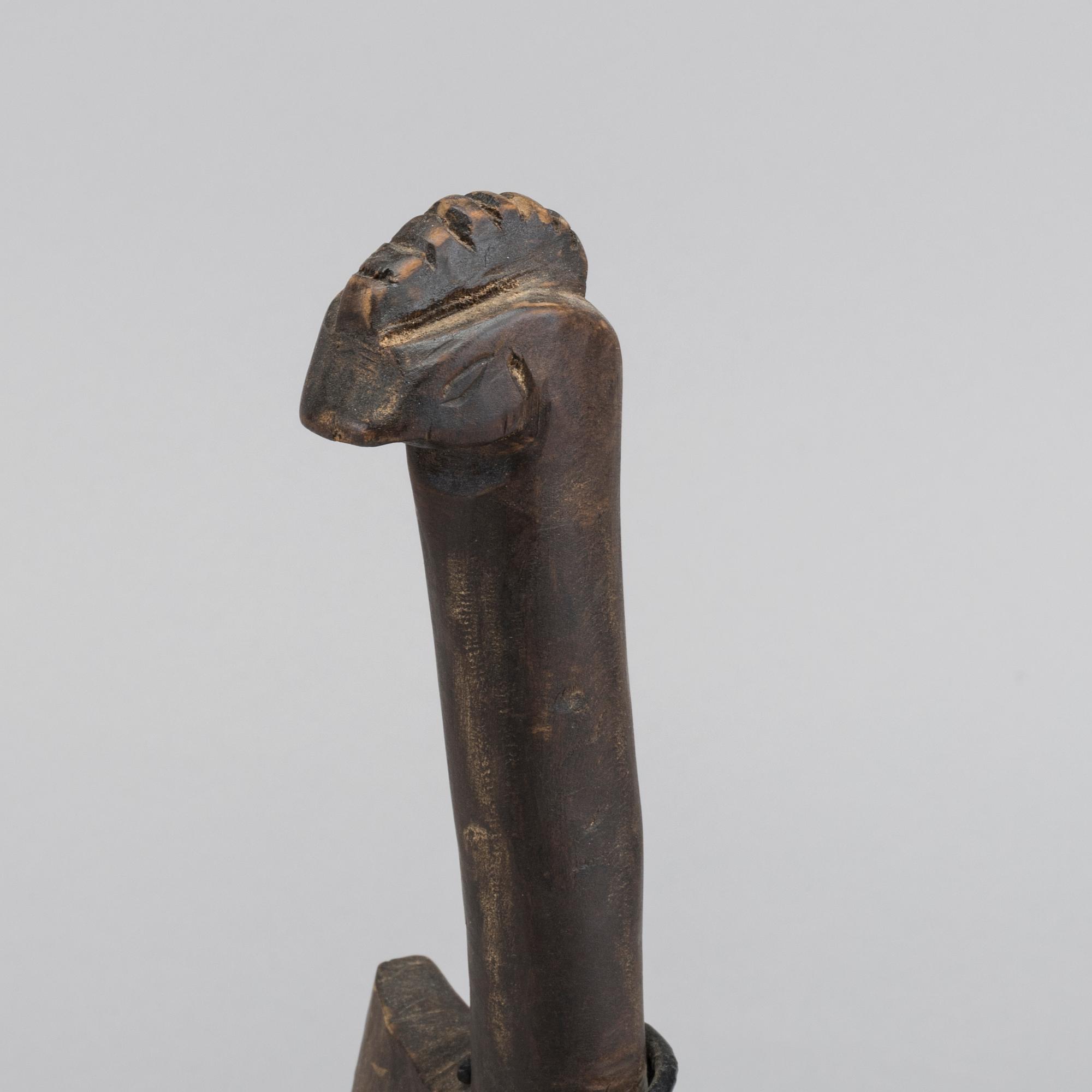 Spoon from the Senufo people of the Ivory Coast.