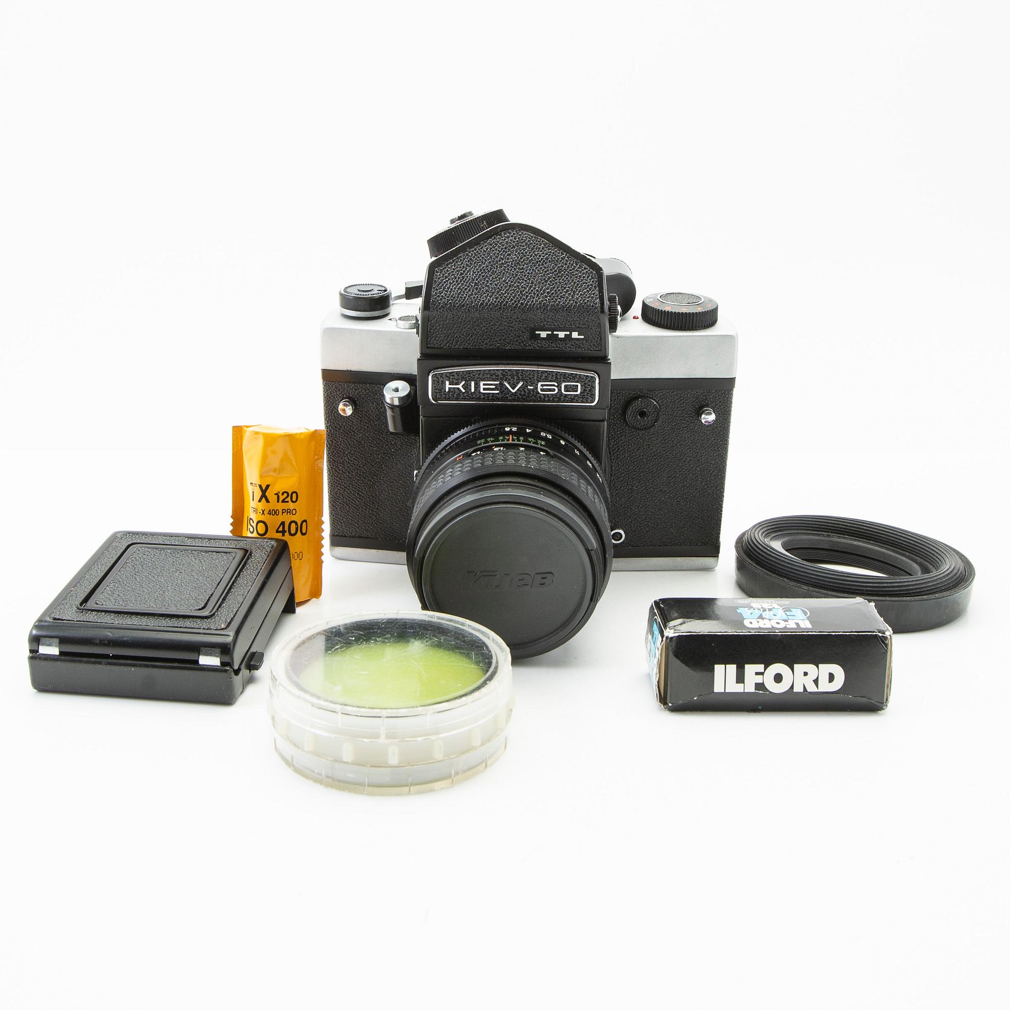 Camera, Kiev 60, and 3 lenses.