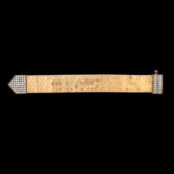 A gold and brilliant cut diamond bracelet, tot. app. 5-6 cts. 1950's.