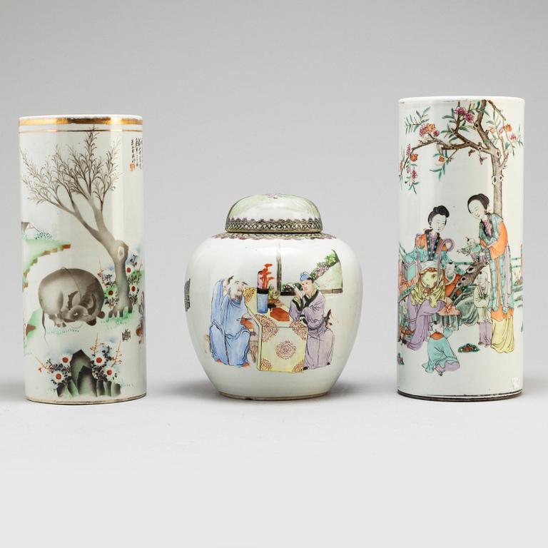 Two Chinese famille rose hat stands and a jar with cover, 20th century.