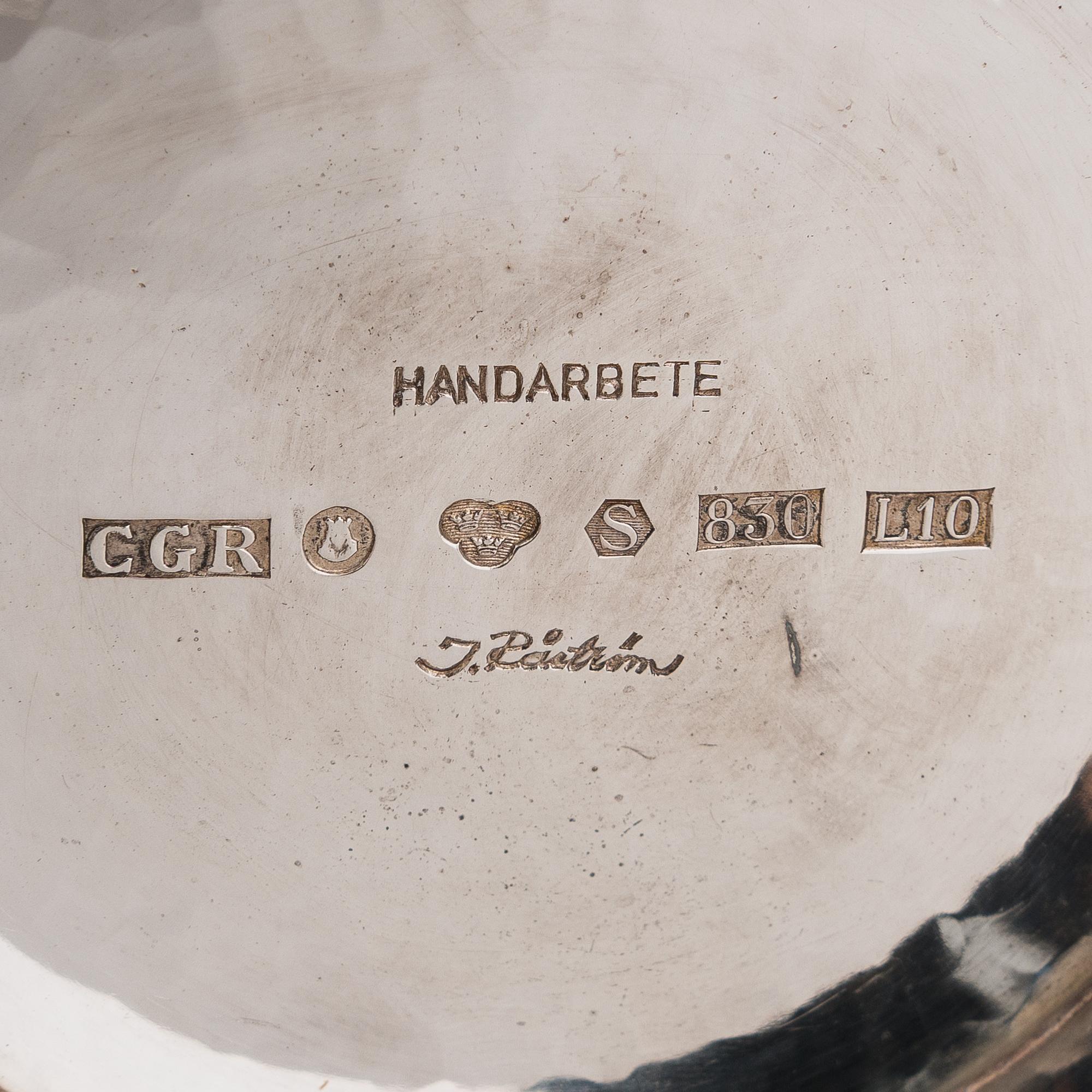 Malja, hopeaa, Ingrid Råström, ja kynttilänjalkapari, hopeaa, Ruotsi 1985 ja 1959.