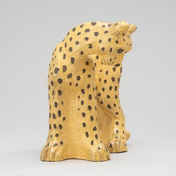 A Vicke Lindstrand yellow glazed ceramic figure of a leopard, Upsala-Ekeby.