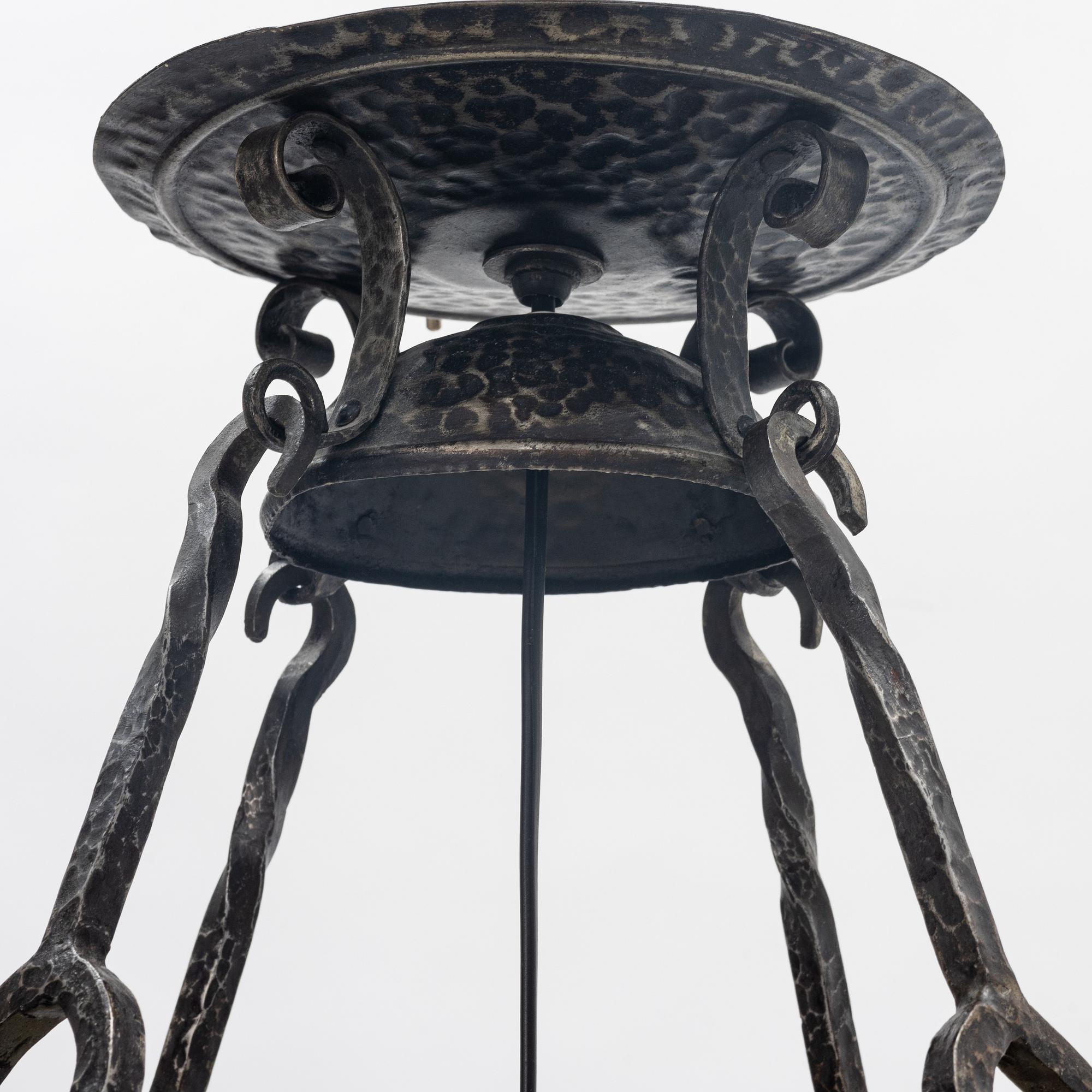A Swedish Art Nouveau ceramic and iron ceiling light, Höganäs, early 20th century.