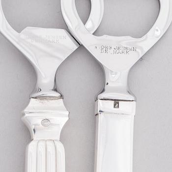 HARALD NIELSEN and SIGVARD BERNADOTTE, Two sterling silver and stainless steel bottle openers, Georg Jensen, Denmark.