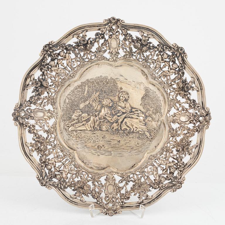 Two silver platters, presumably Wilhelm Weinranck, Hanau, and mock marks, Hanau, Germany, late 19th century.