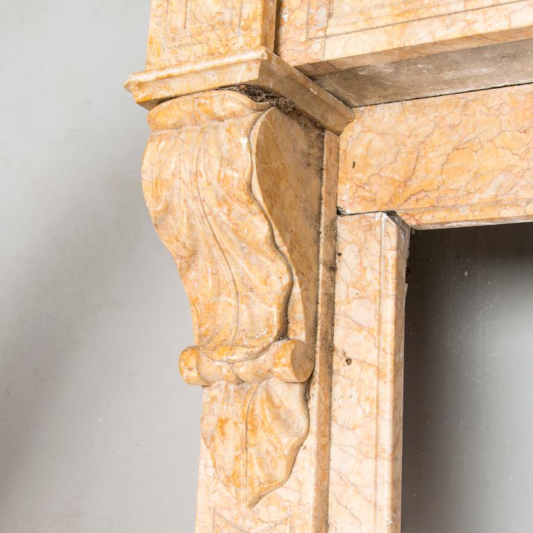A French marble fireplace mantel, circa 1900.