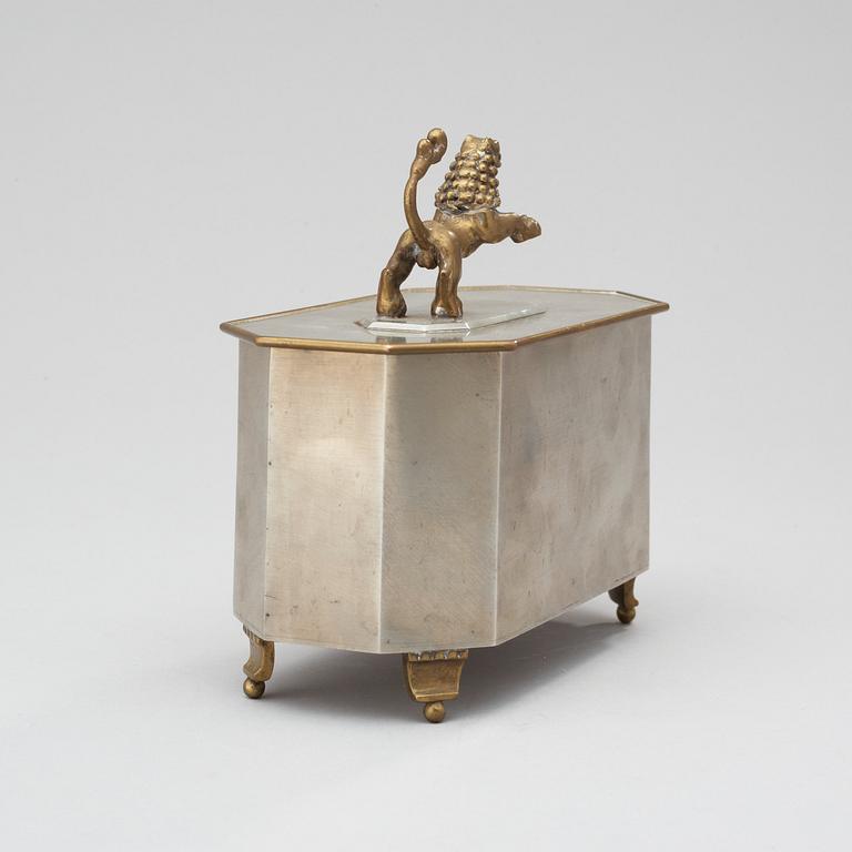A Swedish Grace pewter and brass box, 1930.