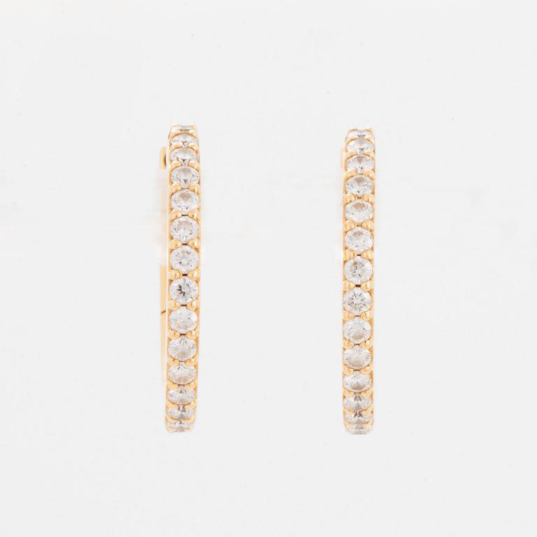 A pair of Ole Lynggaard earrings "Love" in 18K gold set with round brilliant-cut diamonds.