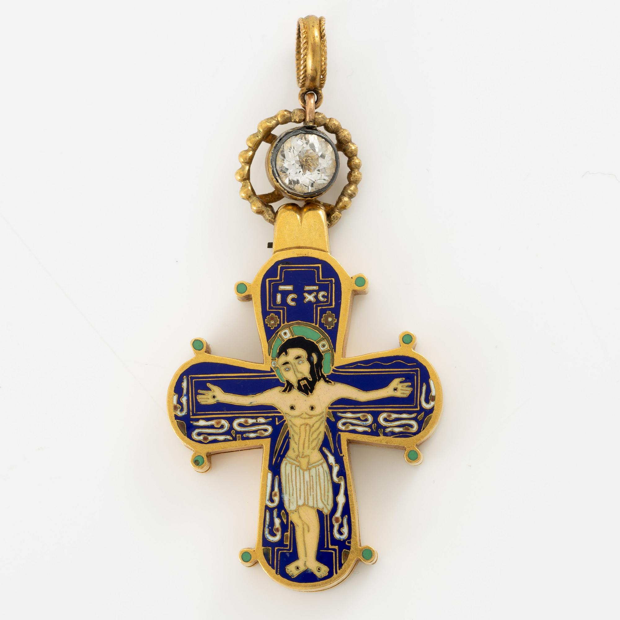 Cross 18K gold with enamel and white stone with relic compartment.