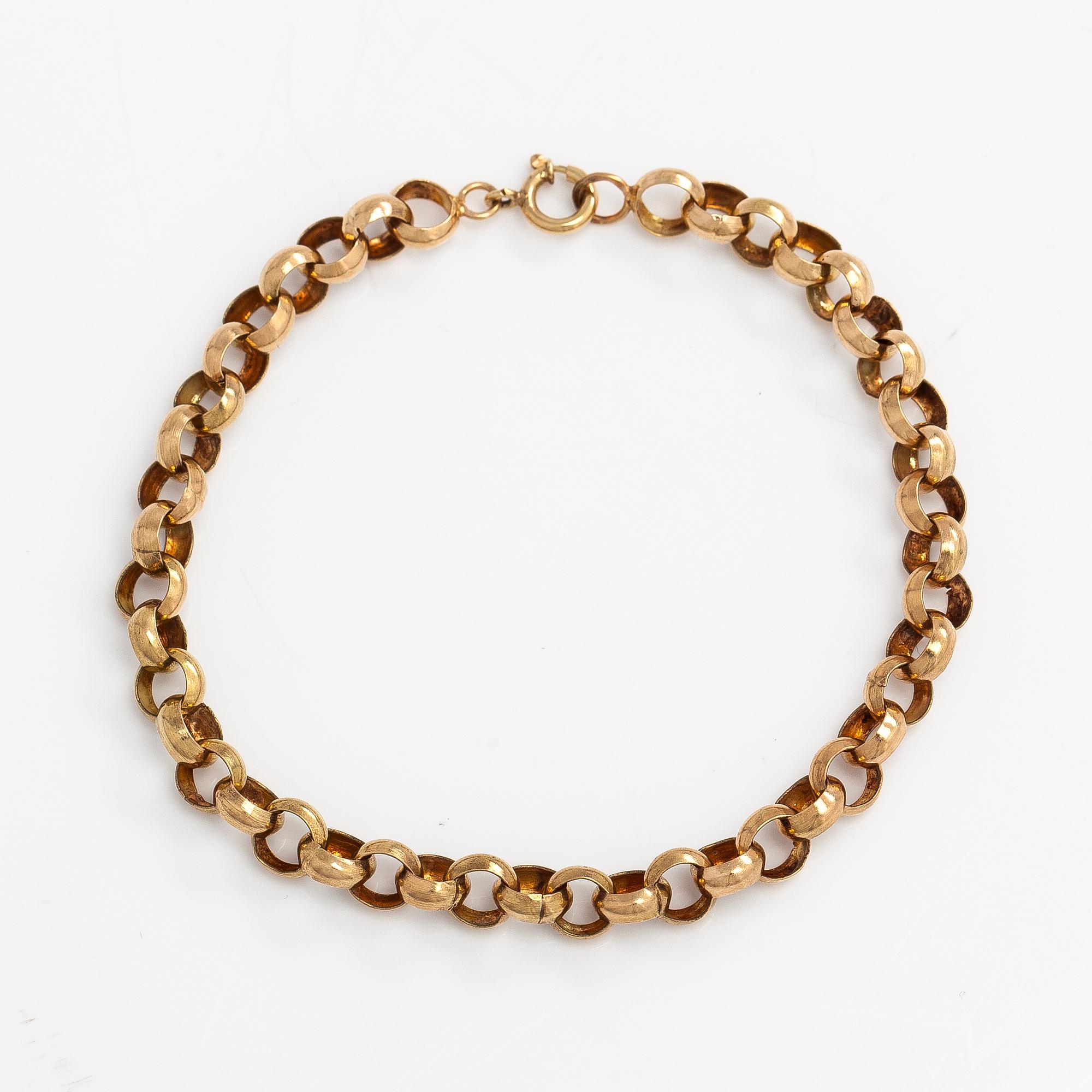 A 14K gold bracelet.