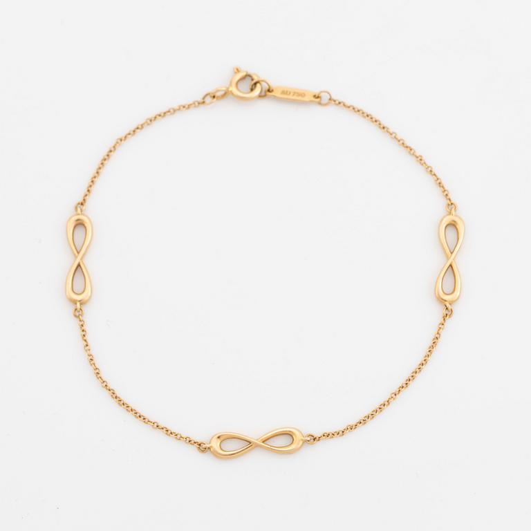 Tiffany & Co, an 'Infinity Endless' 18K bracelet.
