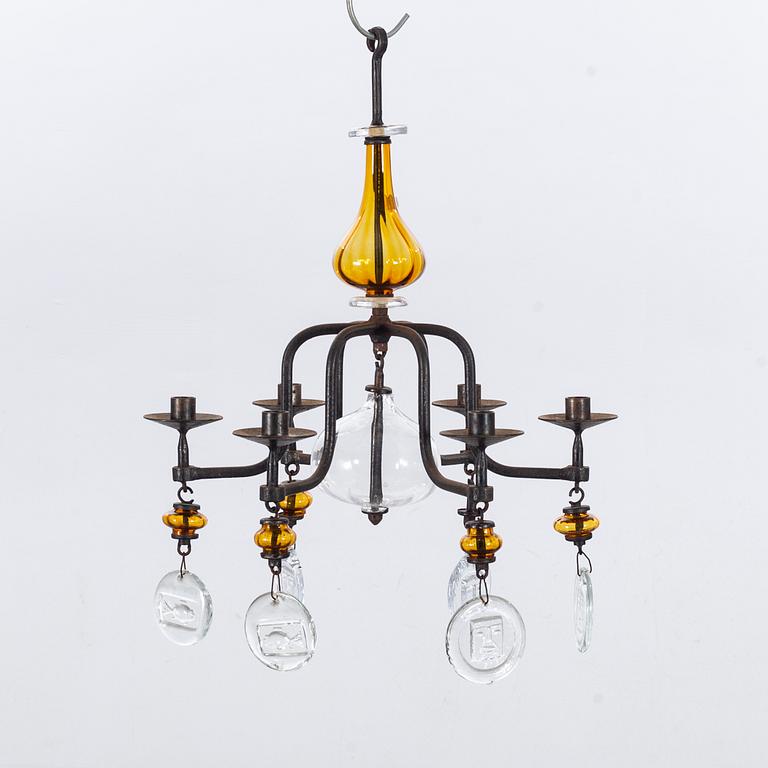 ERIK HÖGLUND,A pair of wall candle holders and a chandelier, kosta Boda, second half of the 20th century.