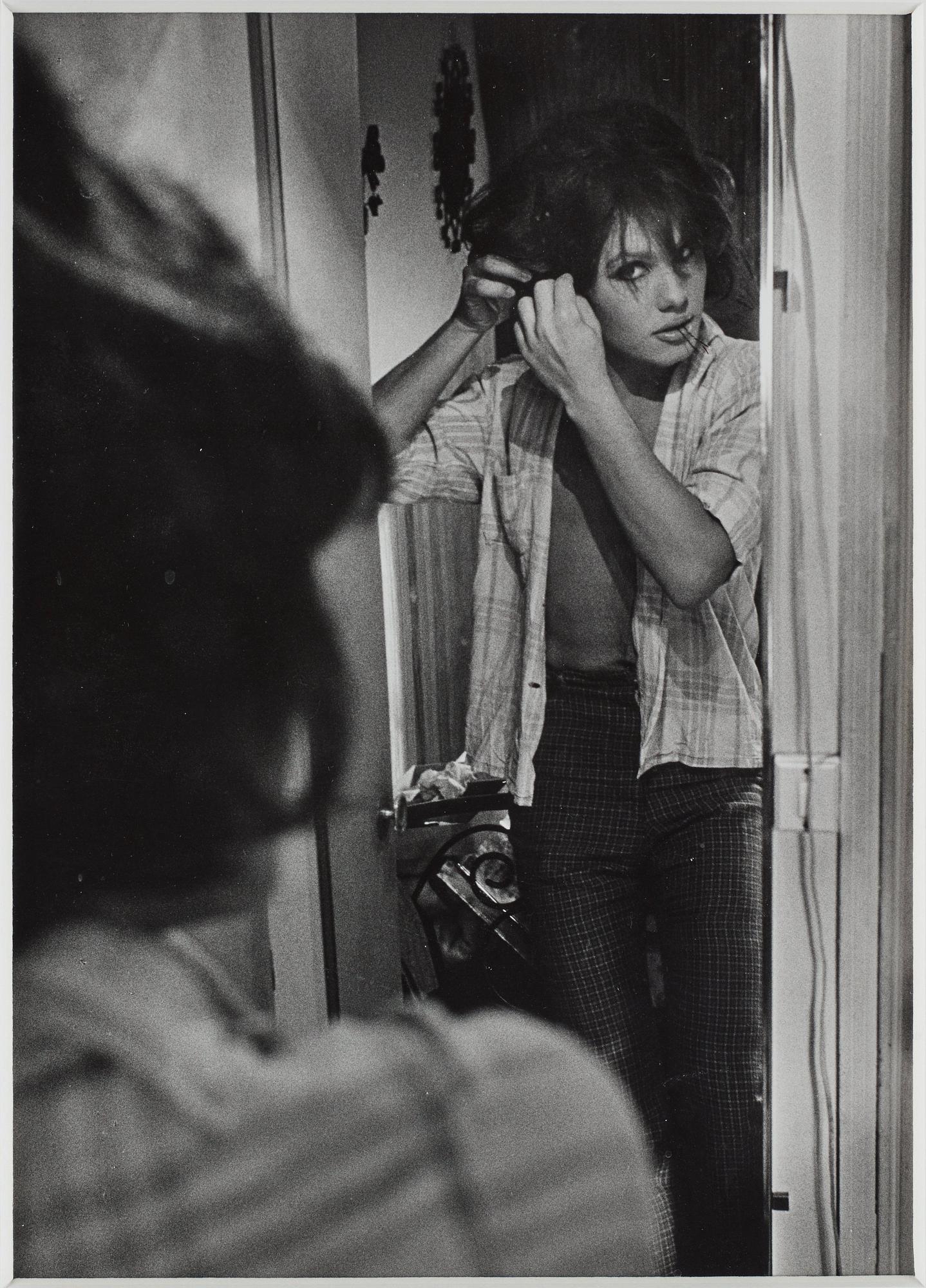 Christer Strömholm, "Tonia, Place Blanche, Paris", 1967.