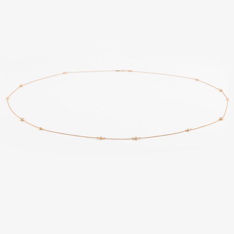 A Tiffany &Co necklace "Diamonds by the yard" design Elsa Peretti in 18K rose gold set with round brilliant-cut diamonds.