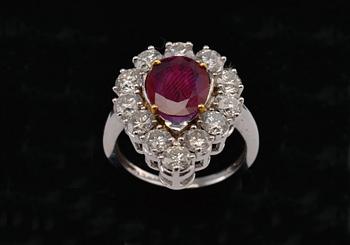 A RING, brilliant cut diamonds c. 2.3 ct, ruby c. 1.16 ct. Weight 5,2 g.