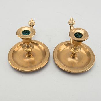 A pair of Gusum brass candelsticks.