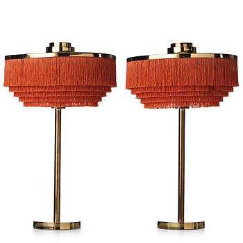 376. Hans-Agne Jakobsson, a pair of model B 138 brass table lights, Markaryd, Sweden 1960's.