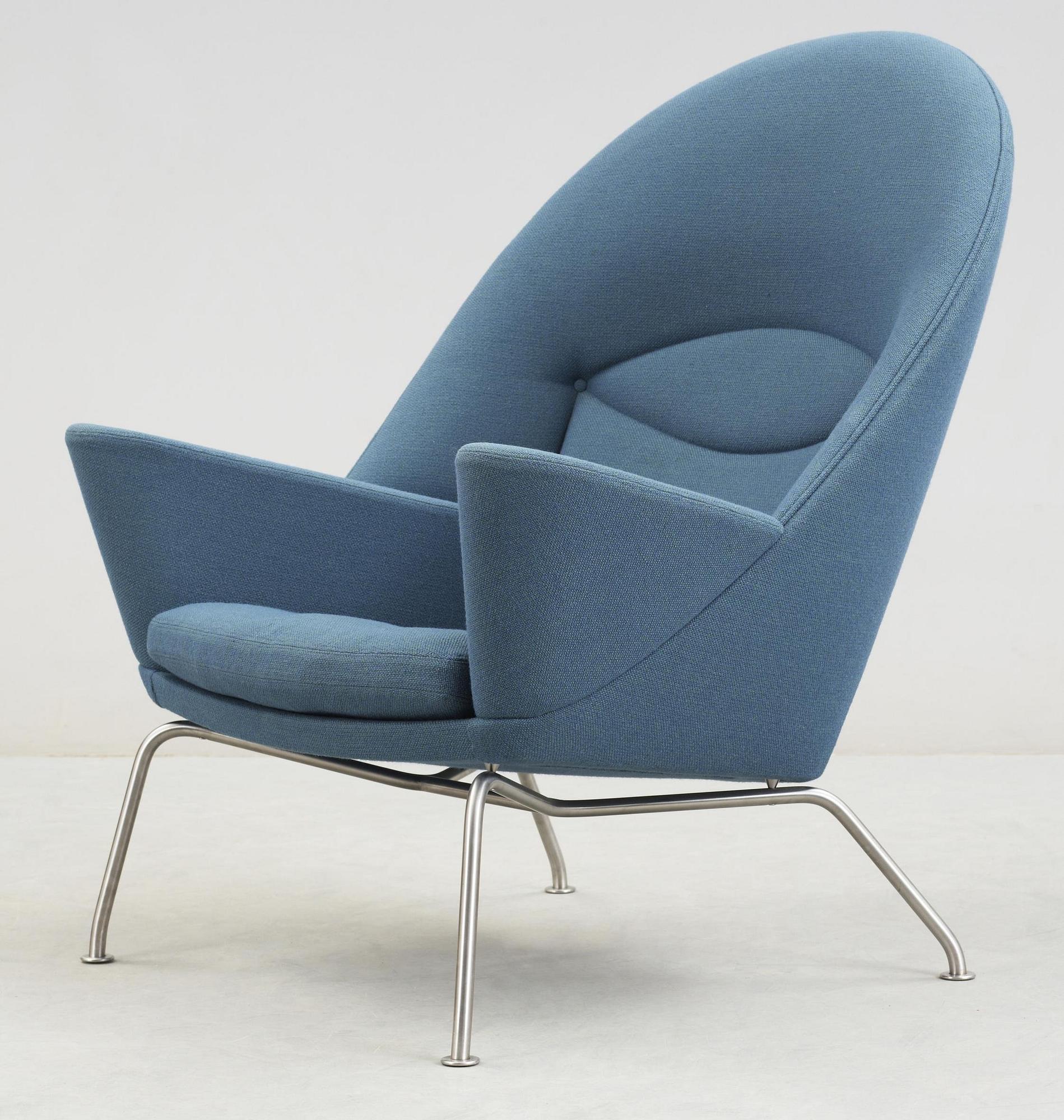 A Hans Wegner 'CH468' armchair, blue fabric, steel legs, Carl Hansen & Søn, Denmark.