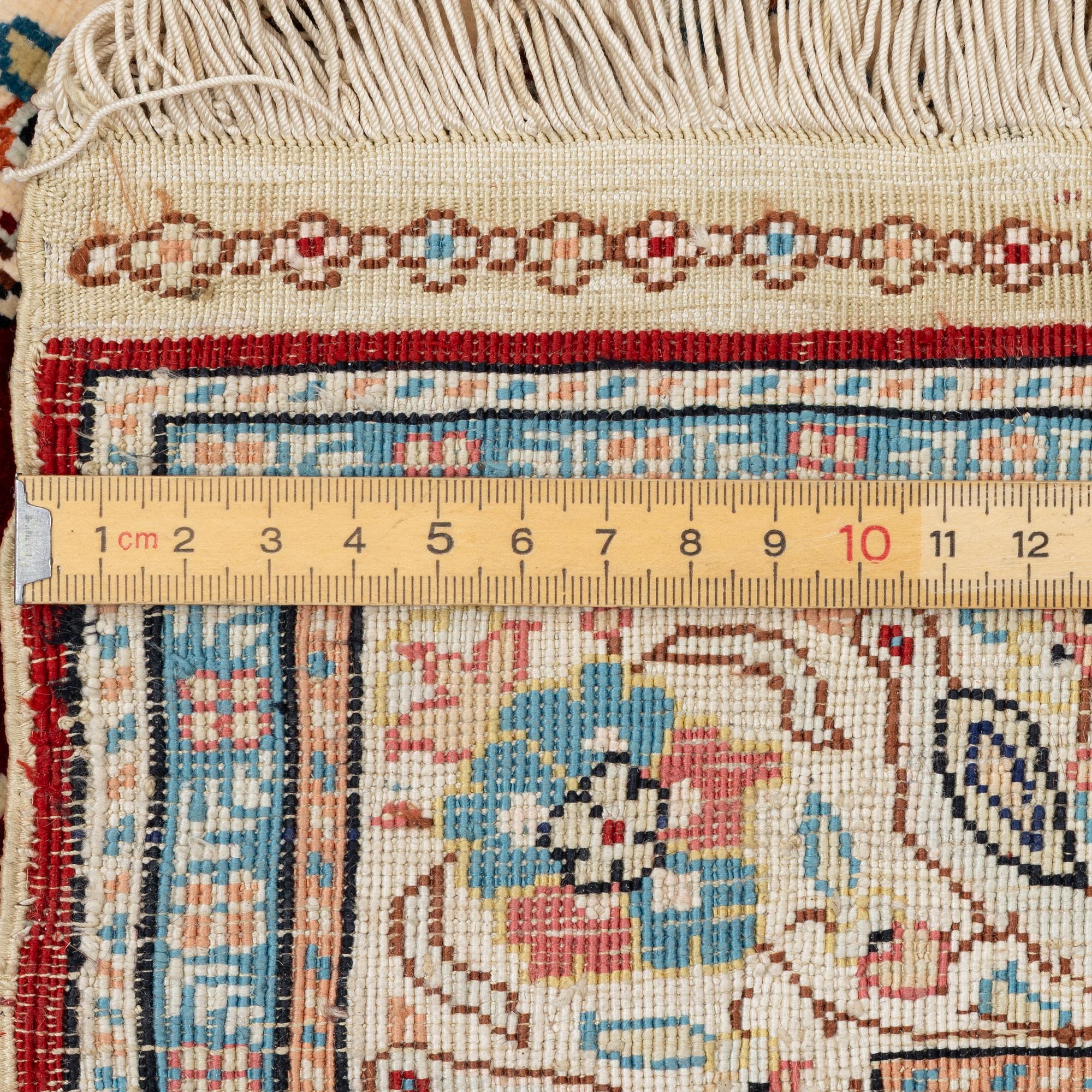 Carpet, Hereke, silk, approx. 98 x 63 cm.