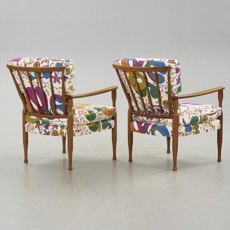 A pair of Josef Frank mahogany armchairs for Svenskt Tenn, model 891.