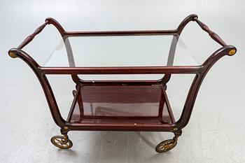 A mid 1900s mahogany serving trolley.