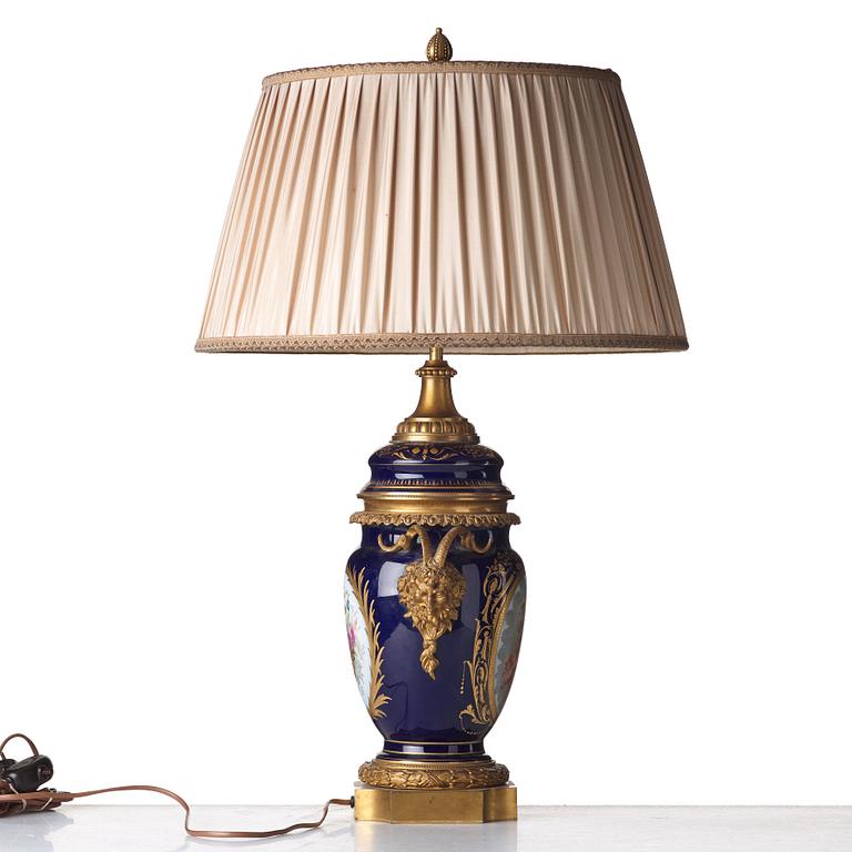 A French bronze mounted porcelain table lamp, late 19th Century, signed Thuilier.