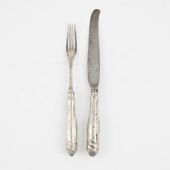 A 15-piece Rococo silver cutlery set, mark of Isak Trybom, Stockholm, including 1770.